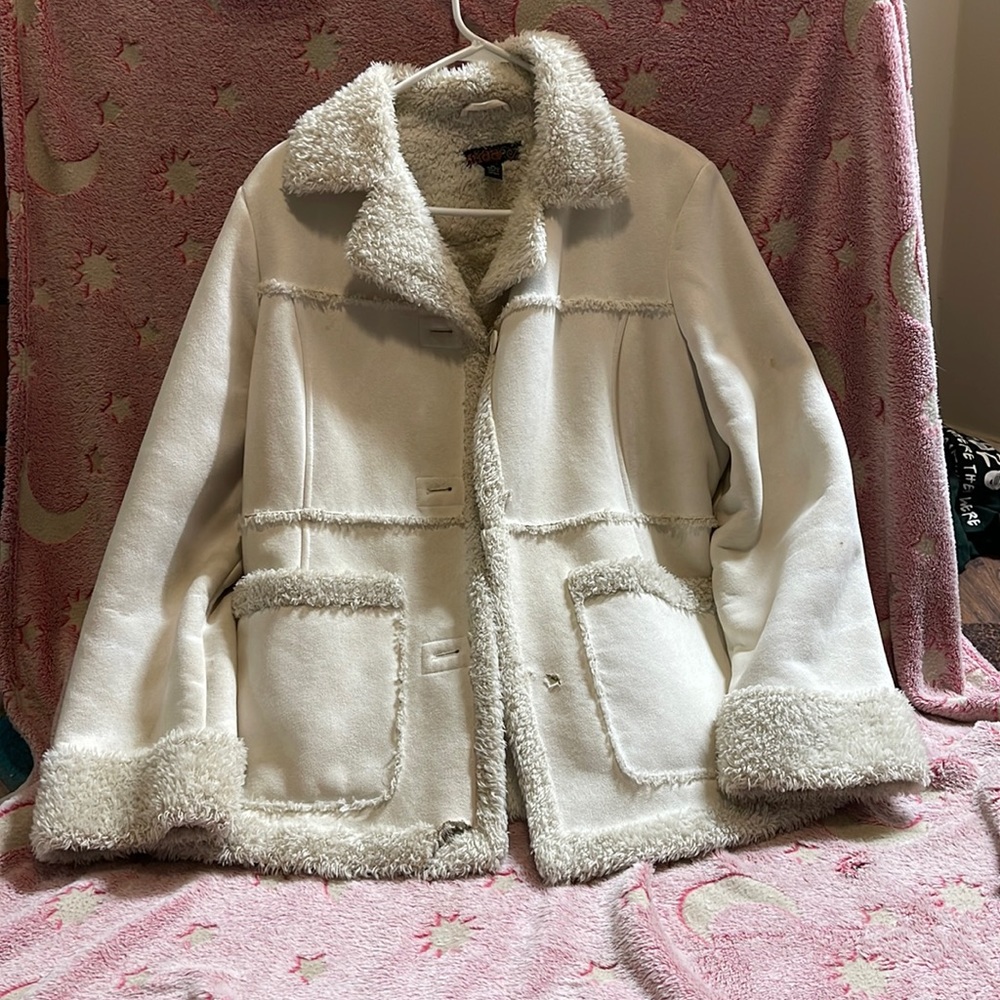 Cream color coat with fluffy inside